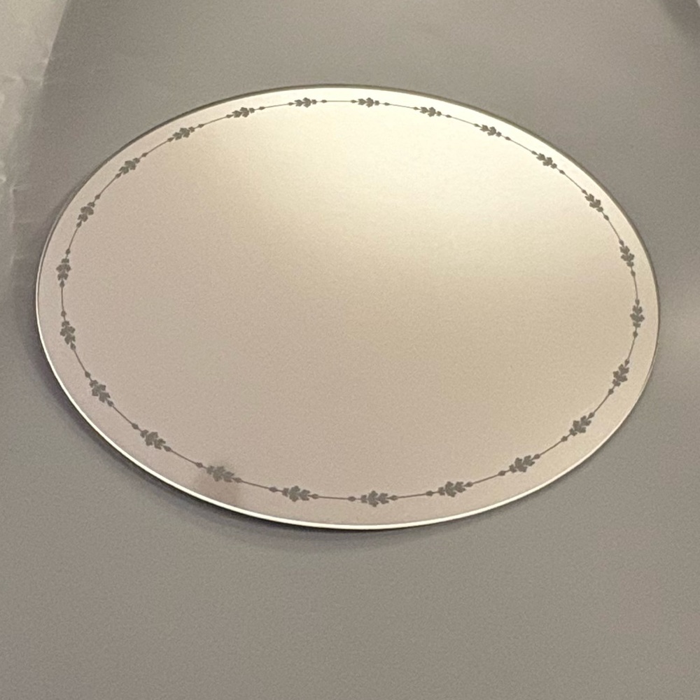 Oval Mirror with Leaf Design